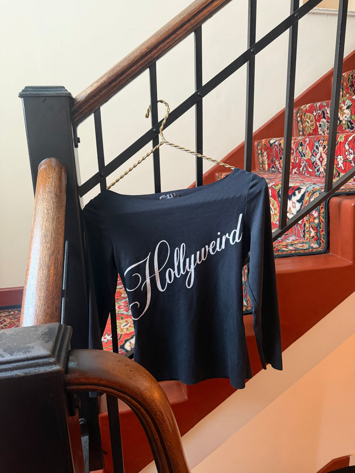 Hollyweird Top - hanging on staircase railing